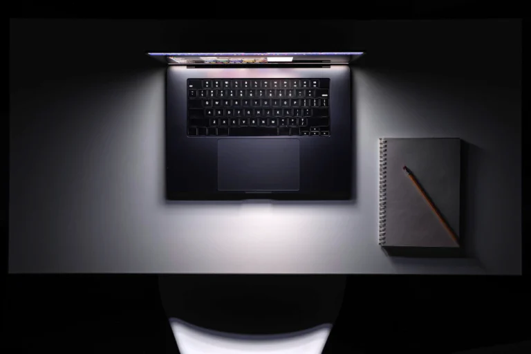 a laptop on a desktop
